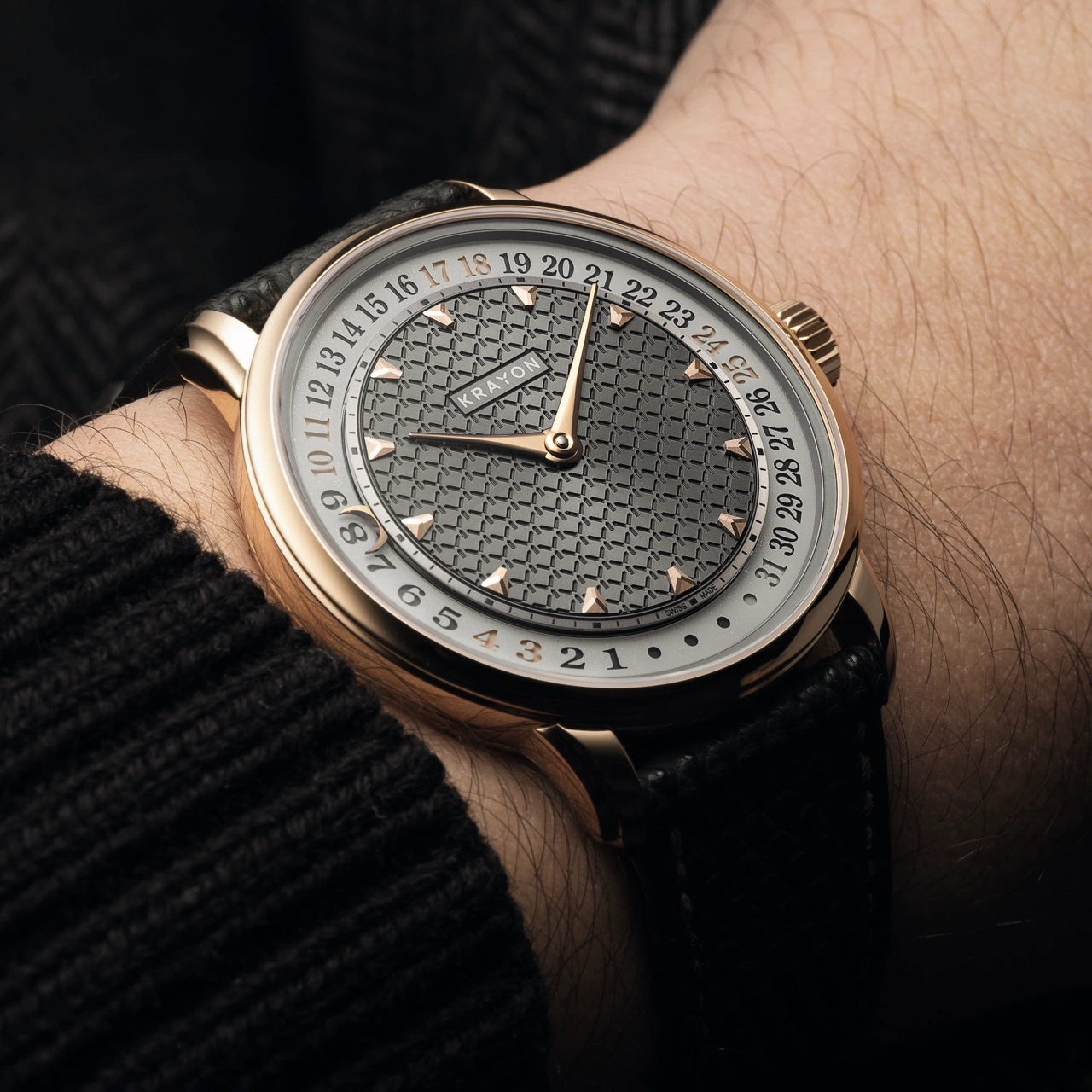 Krayon Anyday in 18K rose gold with anthracite grey dial displaying the full month at a glance