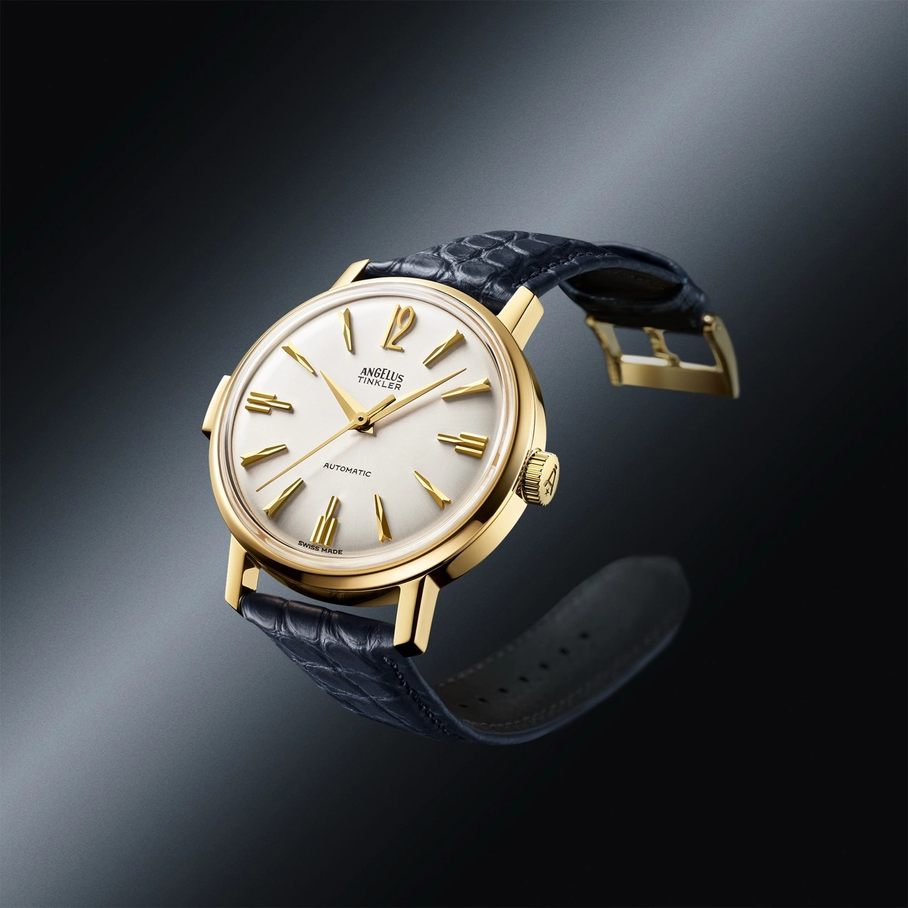 Angelus Tinkler 1958 gold and steel models with ink blue and saddle brown alligator flank straps