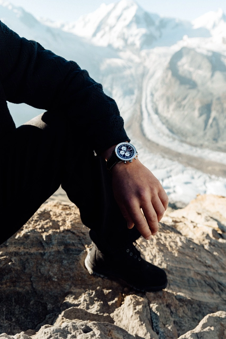 Close-up of Franjo von Allmen wearing the Breitling Navitimer B01 Chronograph 46 off the slopes