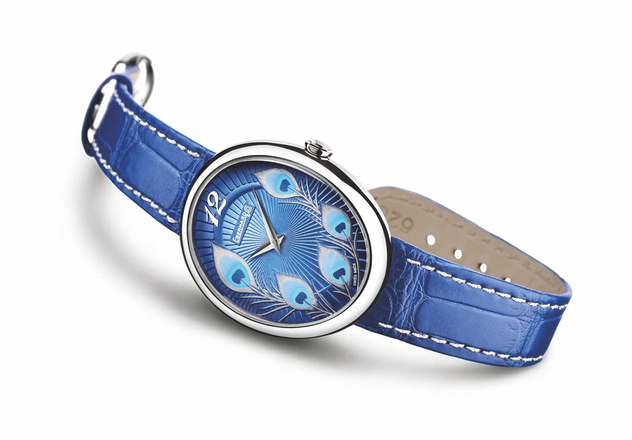 Eberhard & Co Gilda Peacock showing engraved floral caseback and lapis-blue alligator strap