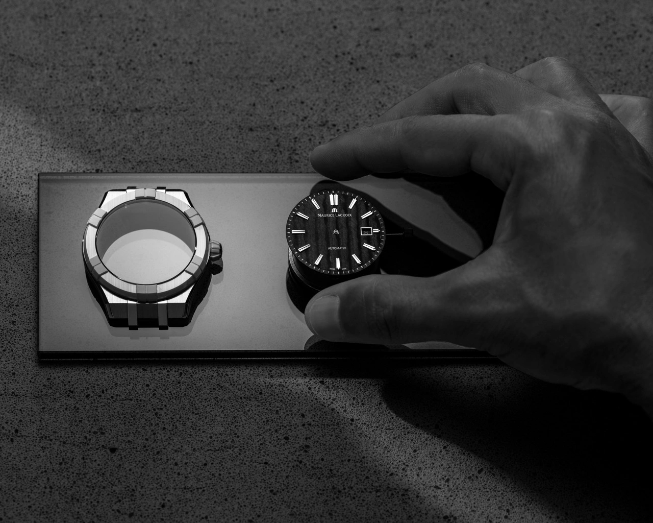 Maurice Lacroix AIKONIC showing the carbon dial, ceramic bezel and bi-rubber strap