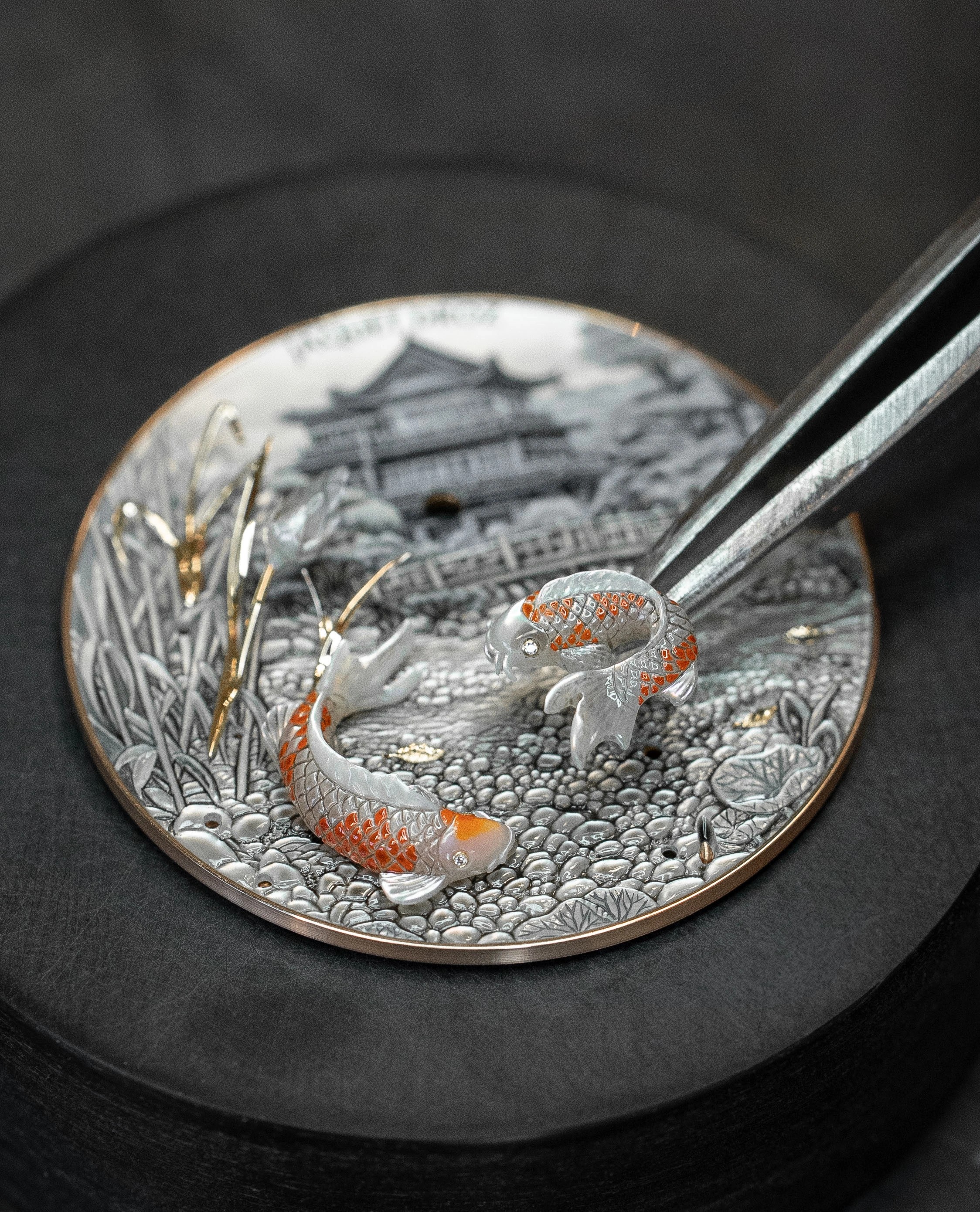 Jaquet Droz Petite Heure Minute Red Gold Japanese Garden dial close-up with koi carp and temple scene
