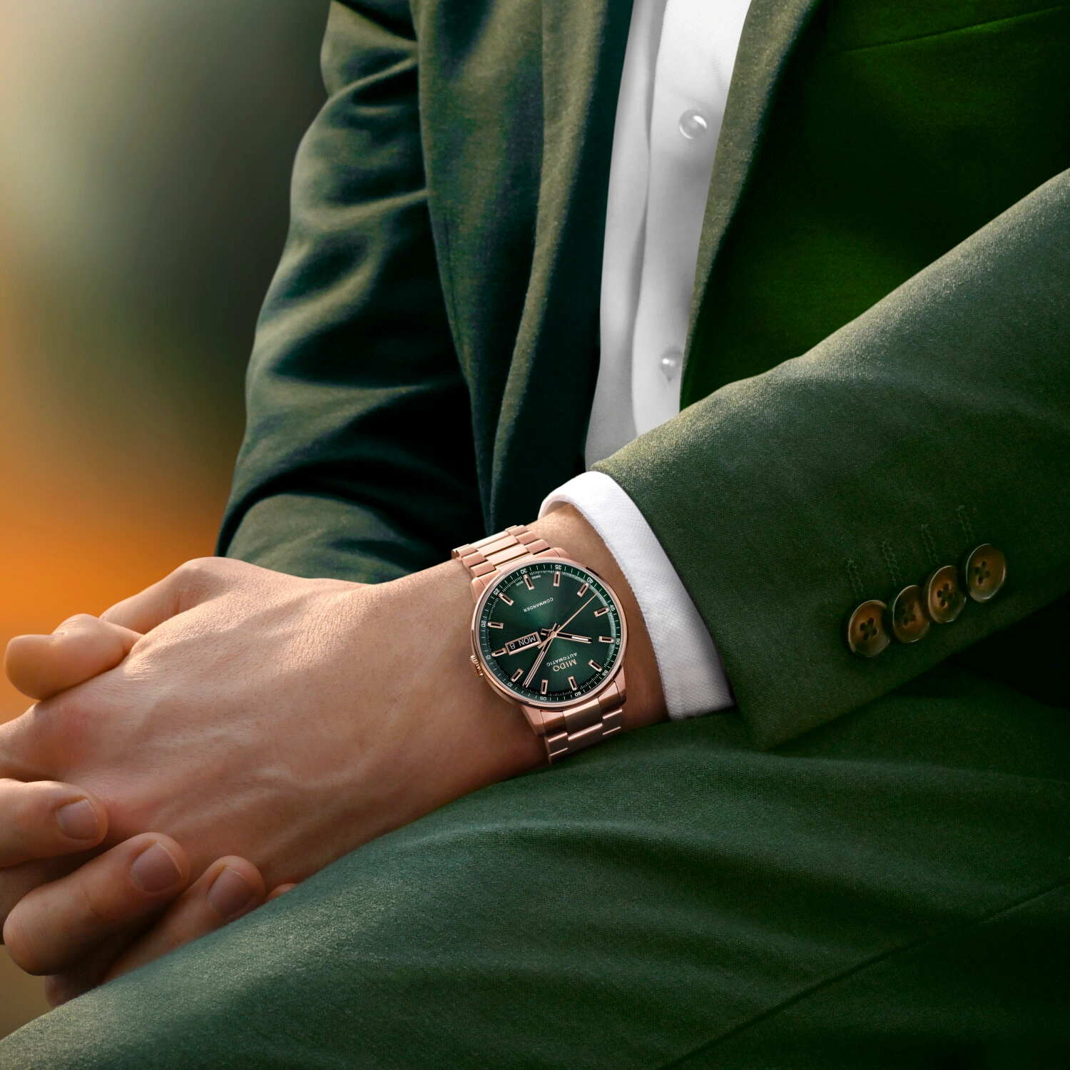 Profile view of the MIDO Commander Datoday highlighting the glassbox sapphire crystal and slim bezel