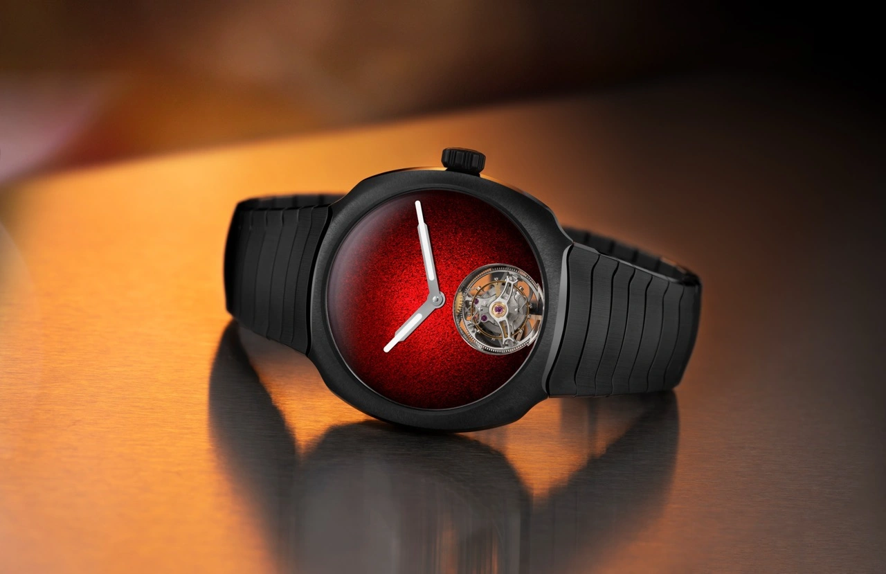 H. Moser & Cie. Streamliner Tourbillon Concept Ceramic caseback showcasing the HMC 805 calibre and red gold oscillating weight