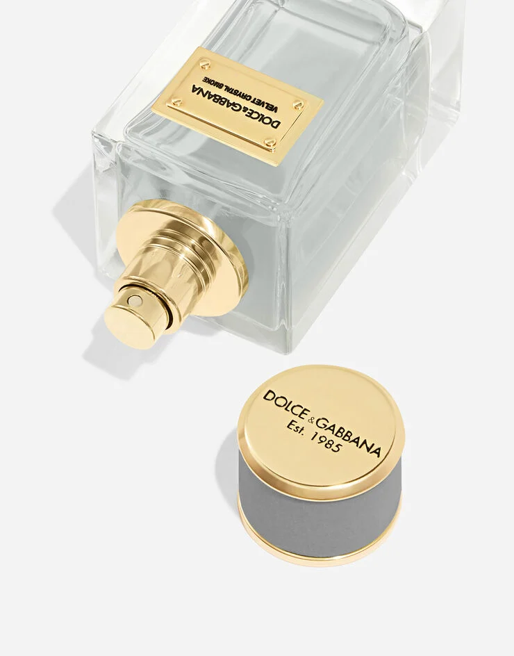 Profile view of Dolce&Gabbana Velvet Crystal Smoke Eau de Parfum flacon with light grey velvet cap