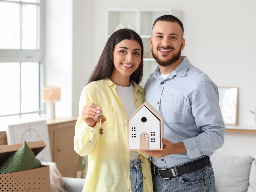 homebuyers holding house keys after home inspection bentonville ar