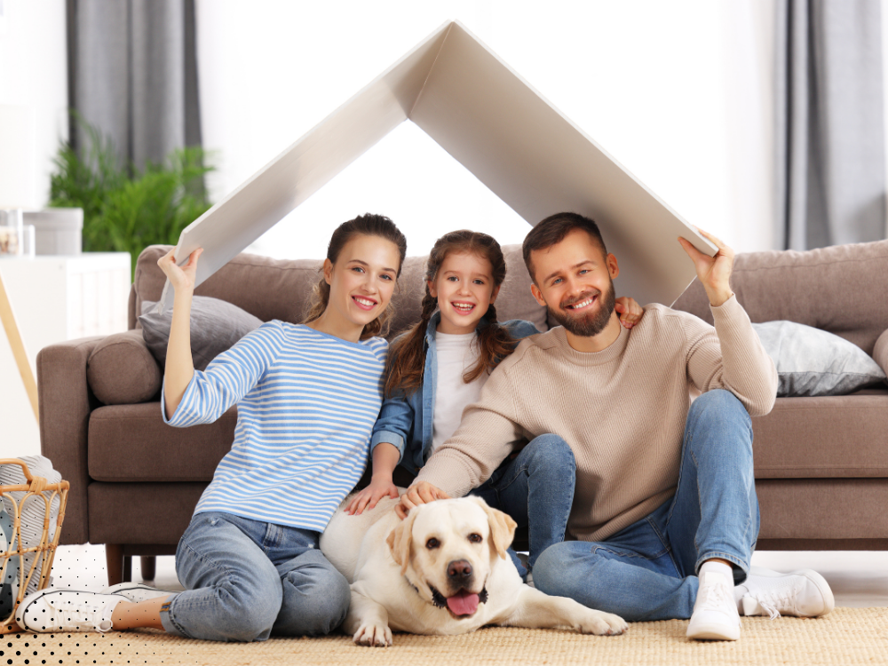 family sitting under roof symbol showing home protection after inspection