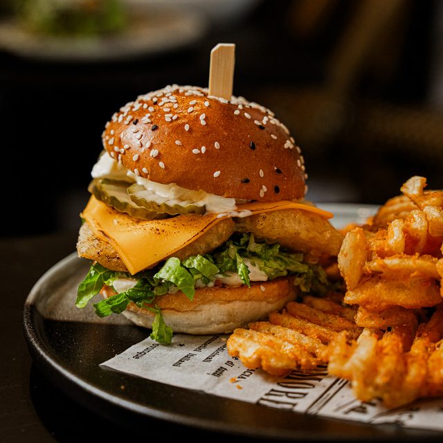 Cheeseburger with waffle fries at Danka
