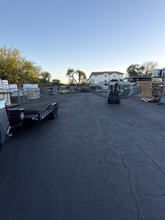 Large 8x20 wire mesh panel being transported using a flatbed trailer rental in Phoenix Arizona by Desert Heat Shotcrete