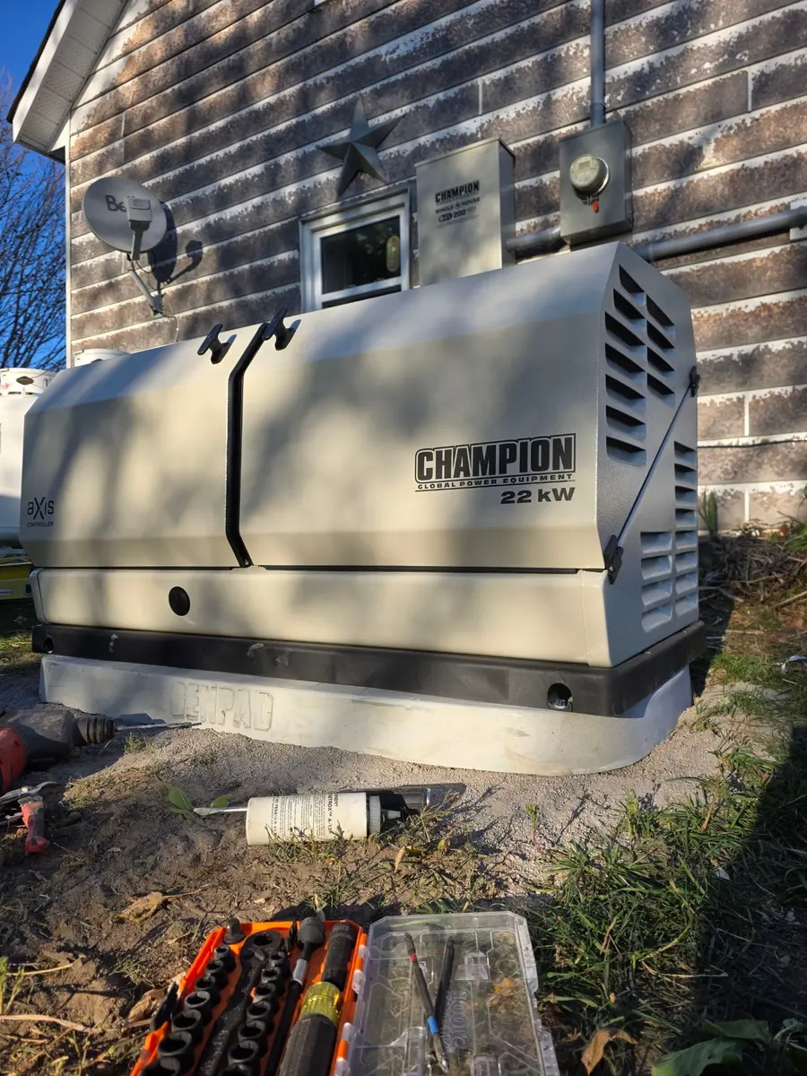 Champion 22kW generator being placed on GENPAD