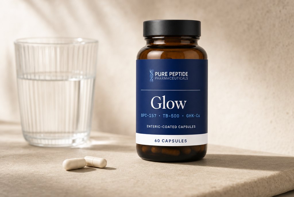 Glow amber glass bottle beside a glass of water