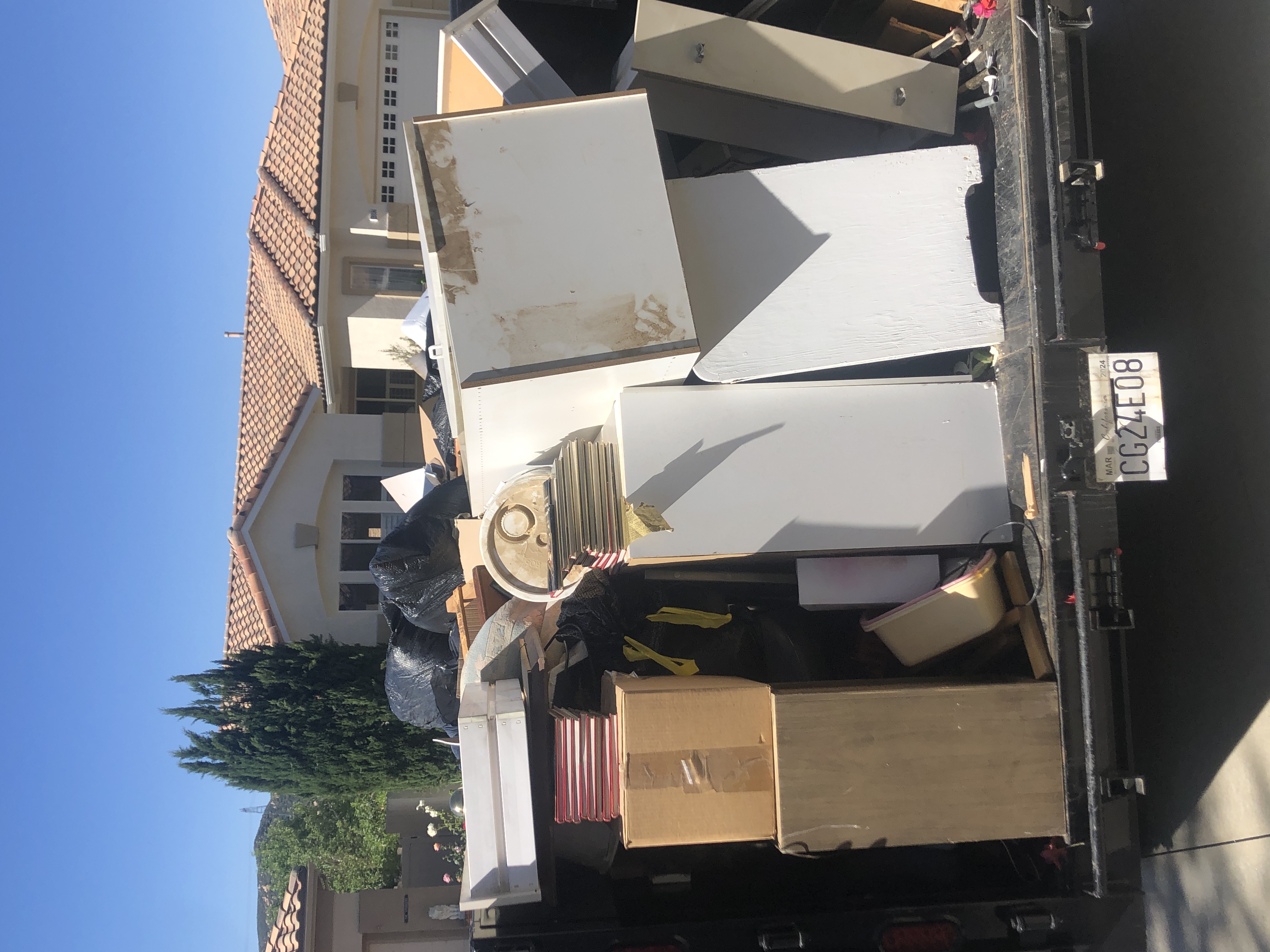 cluttered garage junk removal Beaumont CA before El Mustache Hauling and Junk Removal
