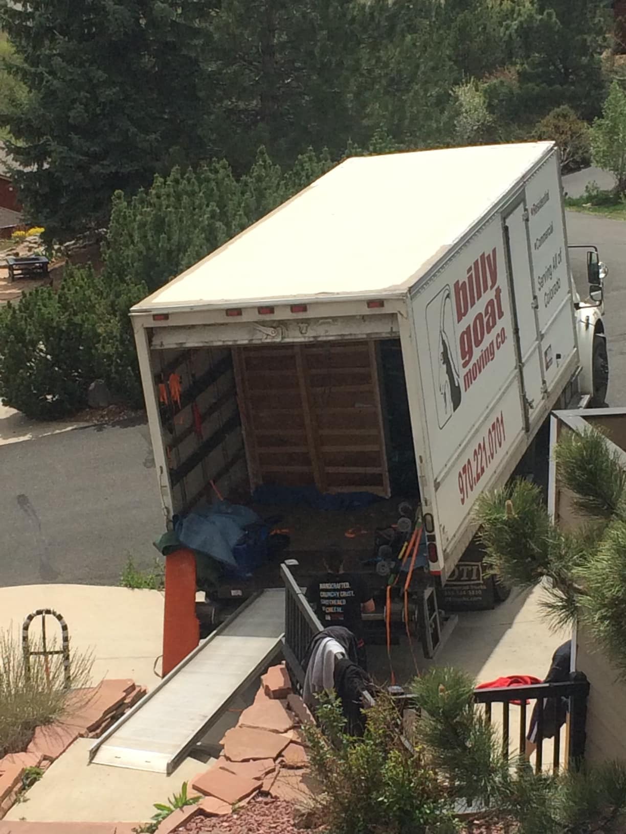 Fort Collins moving team loading furniture into a truck for a residential move
