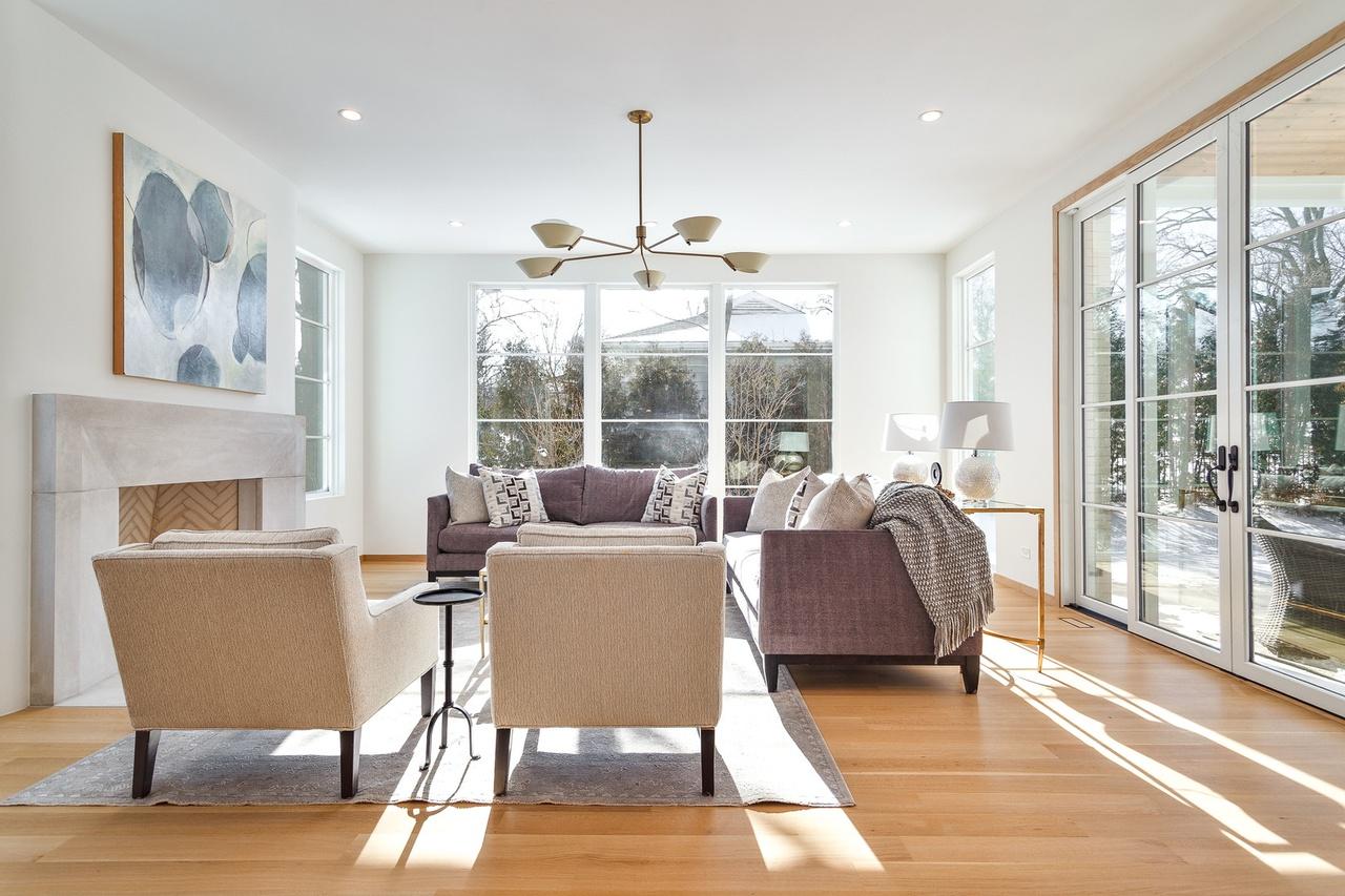 Furnished living room after completion of a new hardwood flooring project.