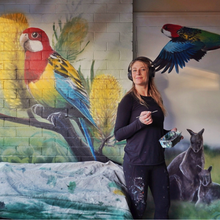 Patrycja with parrots and kangaroo mural