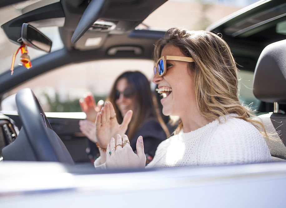 Happy driver protected with car insurance