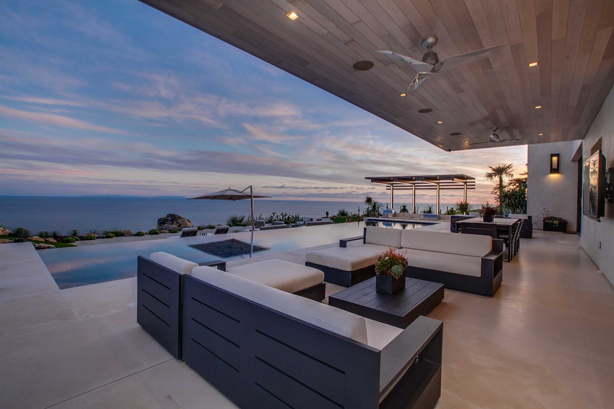 Seamless Indoor Outdoor Living with Ocean Views and Resort Style Entertaining Space