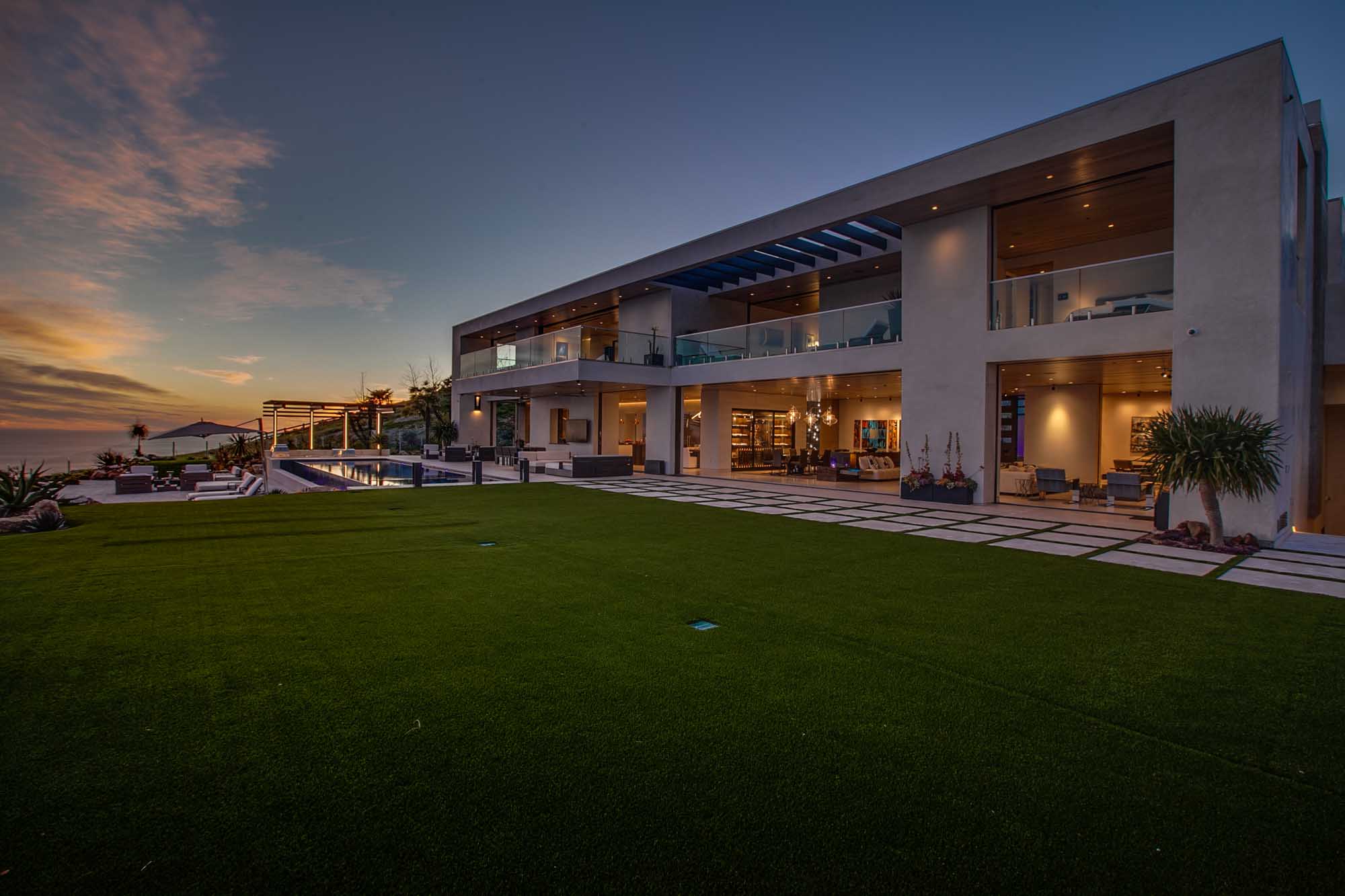 Modern Coastal Estate with Panoramic Ocean Views and Expansive Outdoor Living Space.