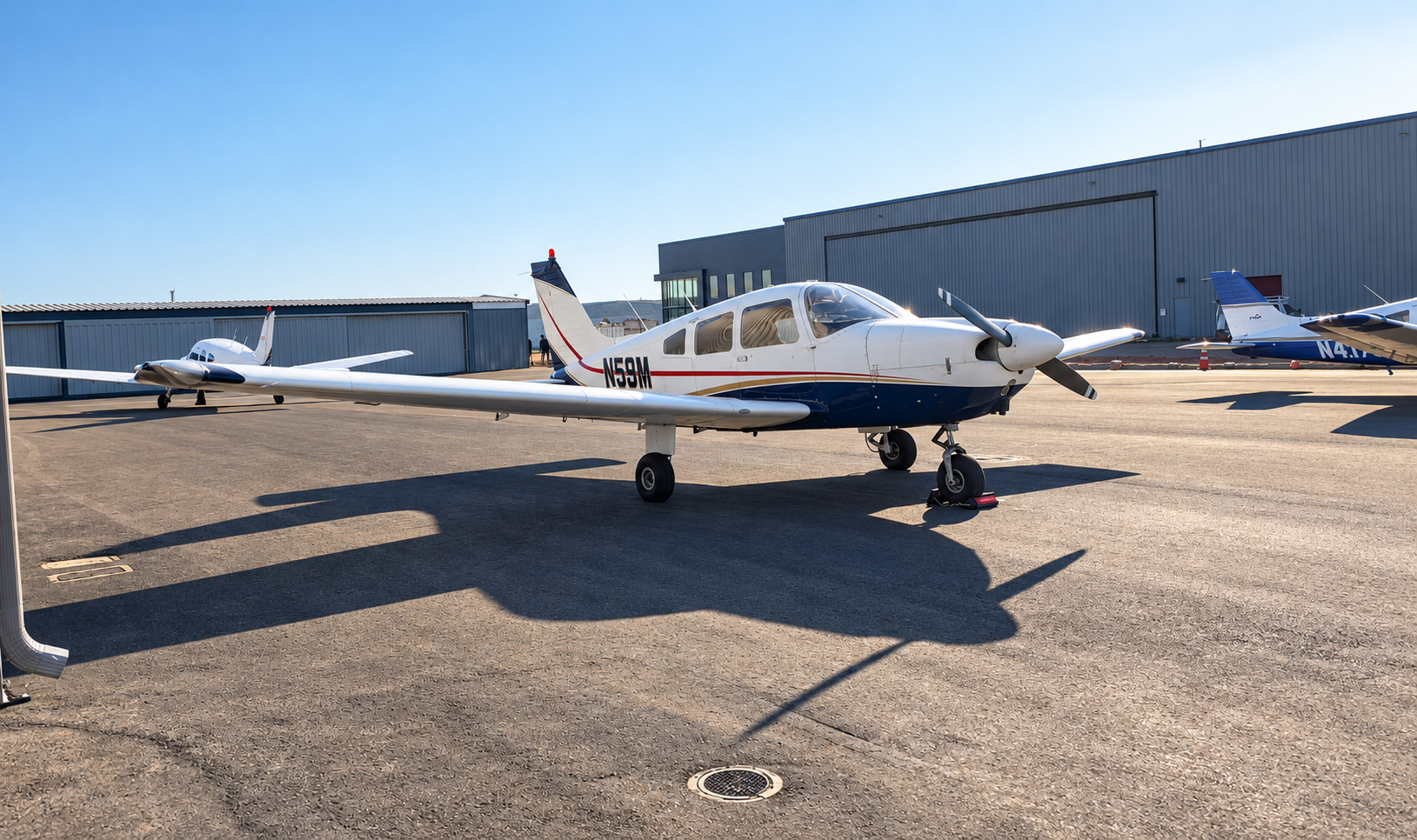 Polished private jet exterior in a hangar
