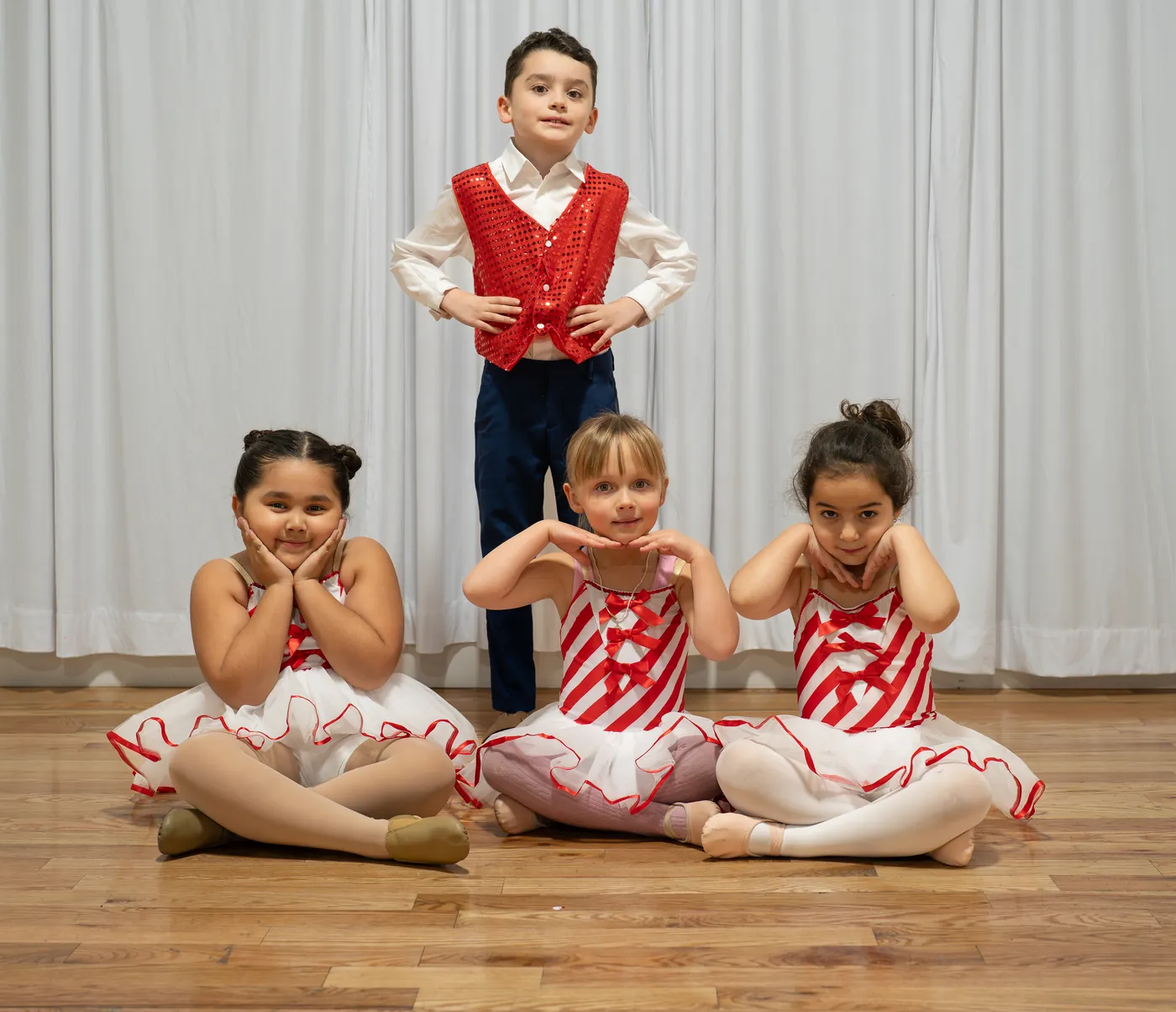 Young Ladu dancers in holiday costumes