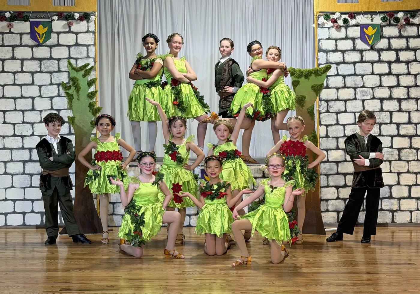 Ladu dancers on stage at a showcase in Sandy, Utah