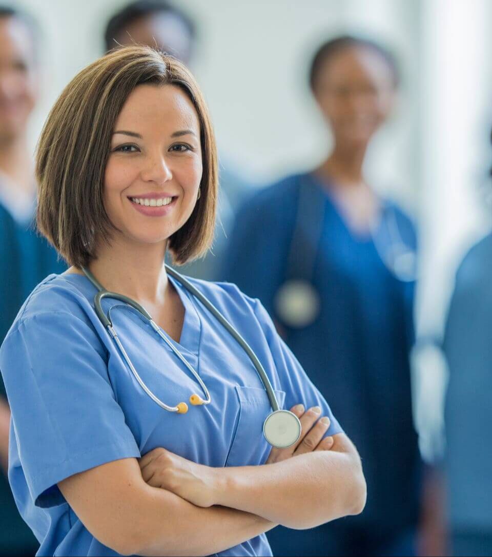 Professional medical professional woman smiling at the camera