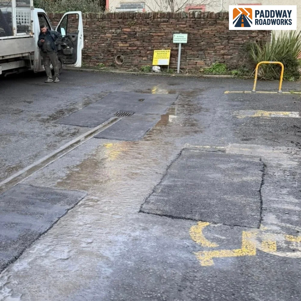 BEFORE — same broken parking bay, alternate angle showing van.