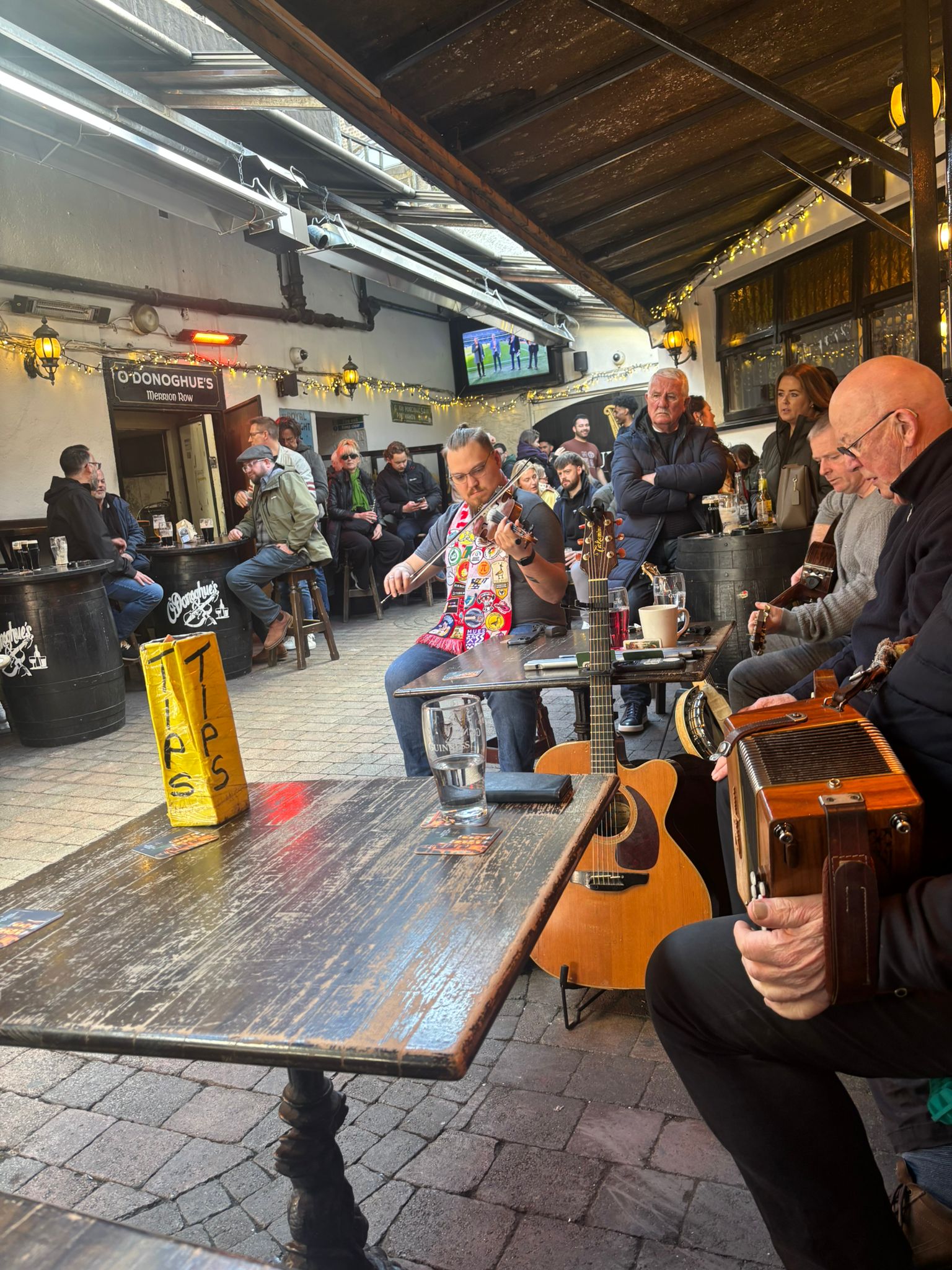 Kay celebrating in Dublin listening to live music in the city
