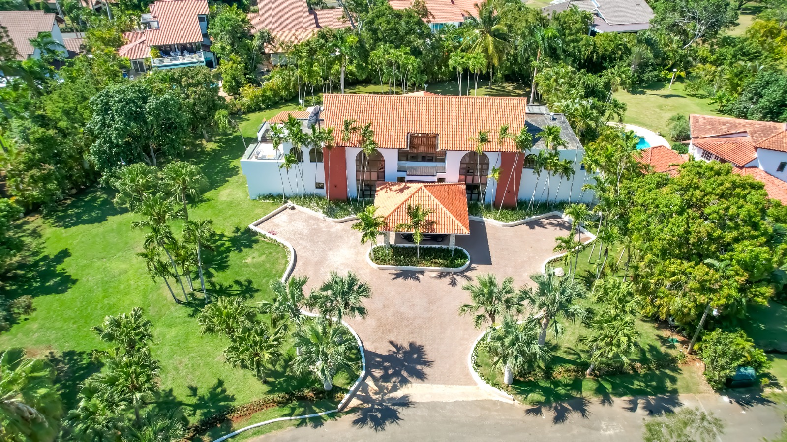 Approach and gardens of a private villa at Casa de Campo.