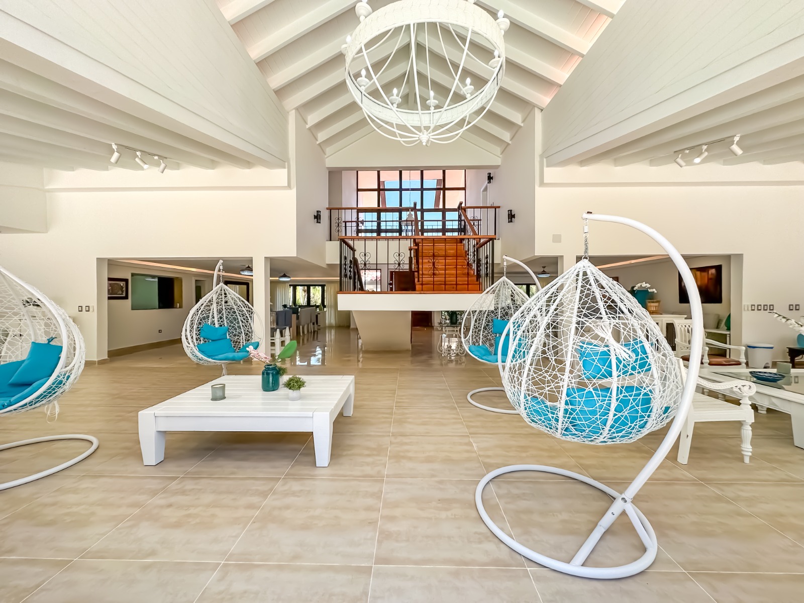Lounge with hanging chairs at a private villa at Casa de Campo.
