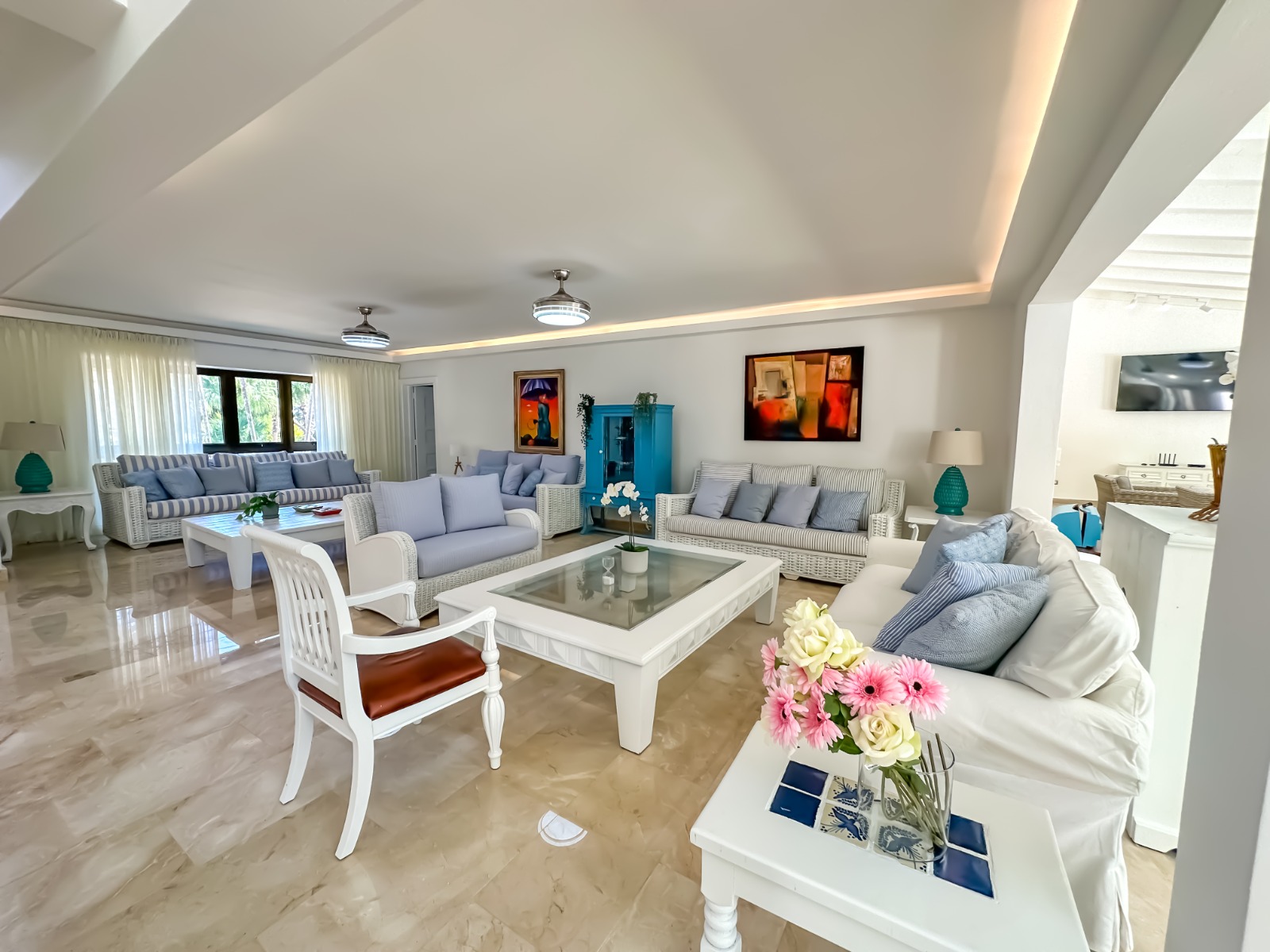 Lounge with blue tables at a private villa at Casa de Campo.