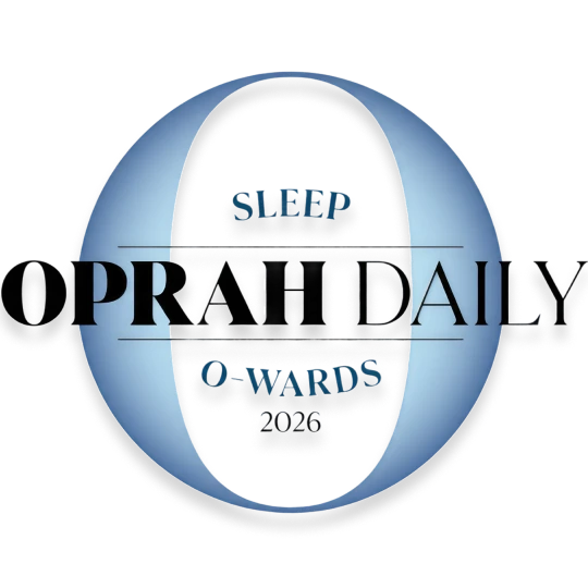 A badge representing Helix's win as best mattress for couples by Oprah Daily