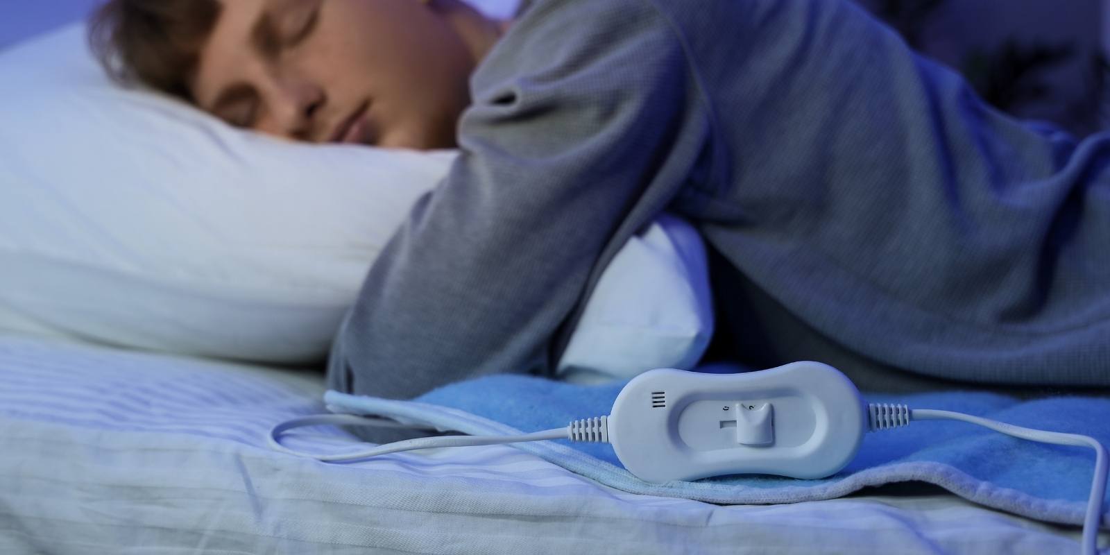 Hybrid mattress cutaway showing pocketed coils and a cooling gel-infused cover for hot sleepers