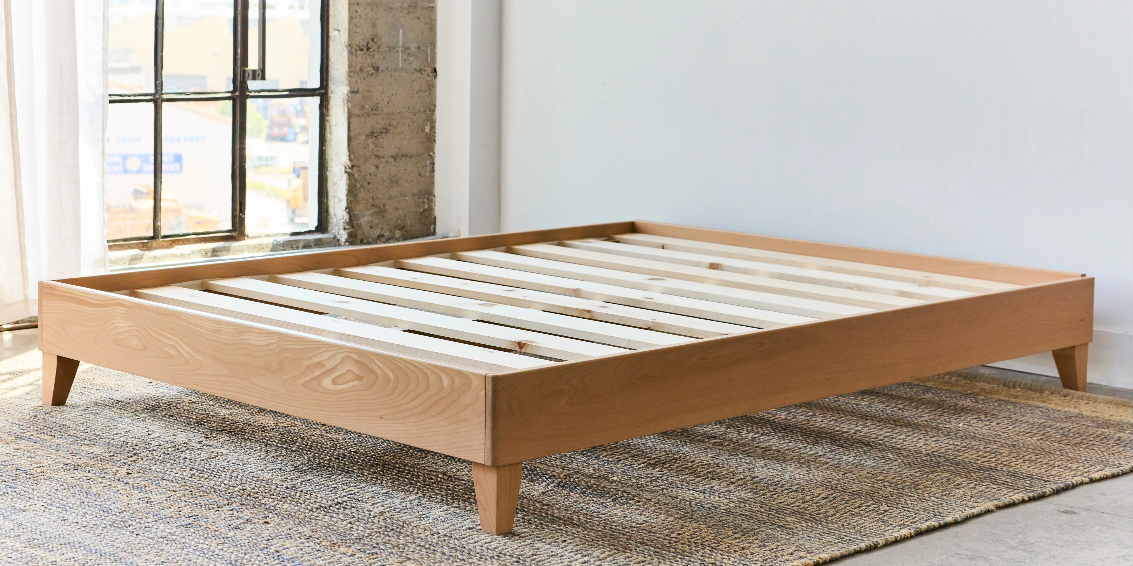 Avocado City Bed blonde finish detail
