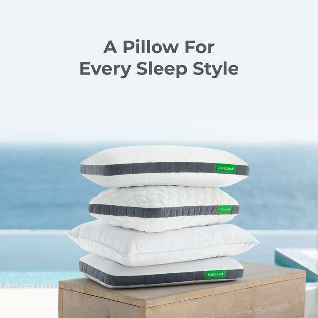 Resort Pillow styled on bed
