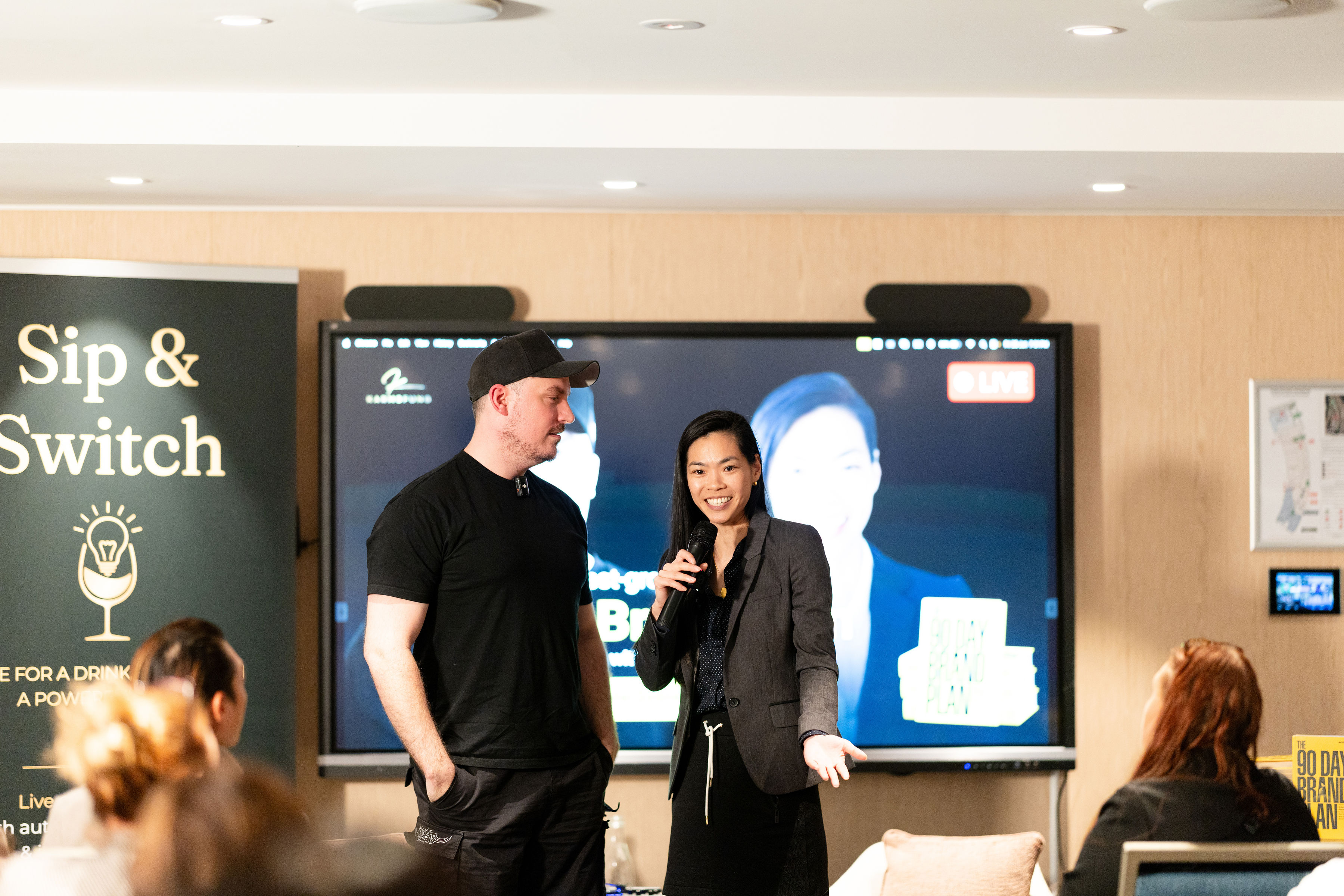 Karms on stage with Dain Walker at Sip & Switch
