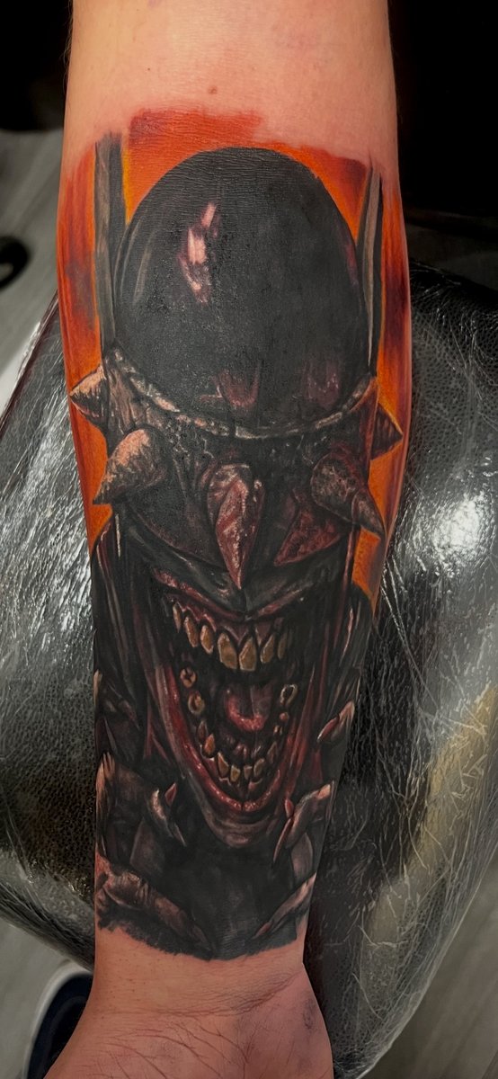 Dark realism alien tattoo by Aidin Chimney, black and grey Manchester