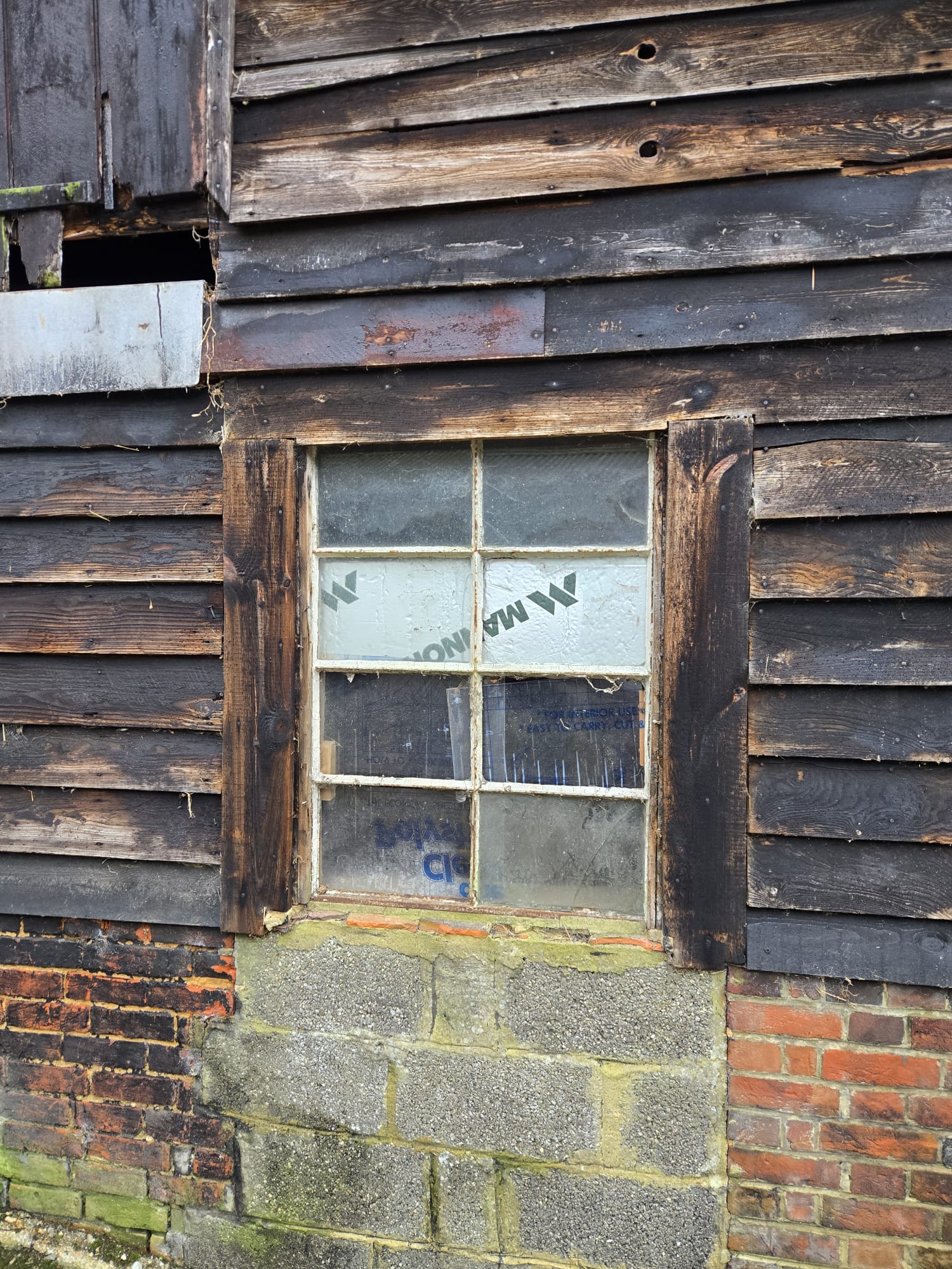 Broken Window Before West's Windows and Doors