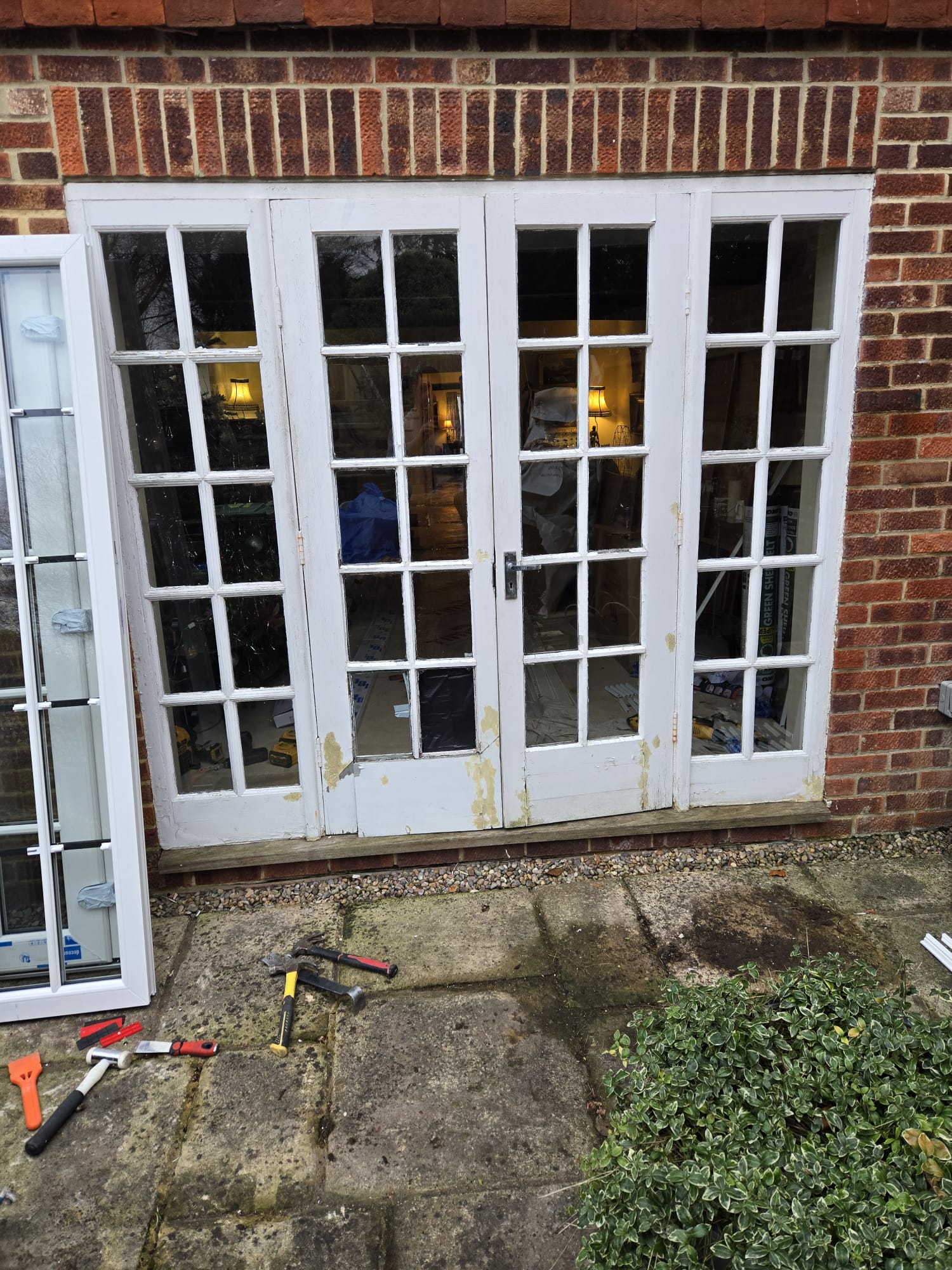 Broken patio door before