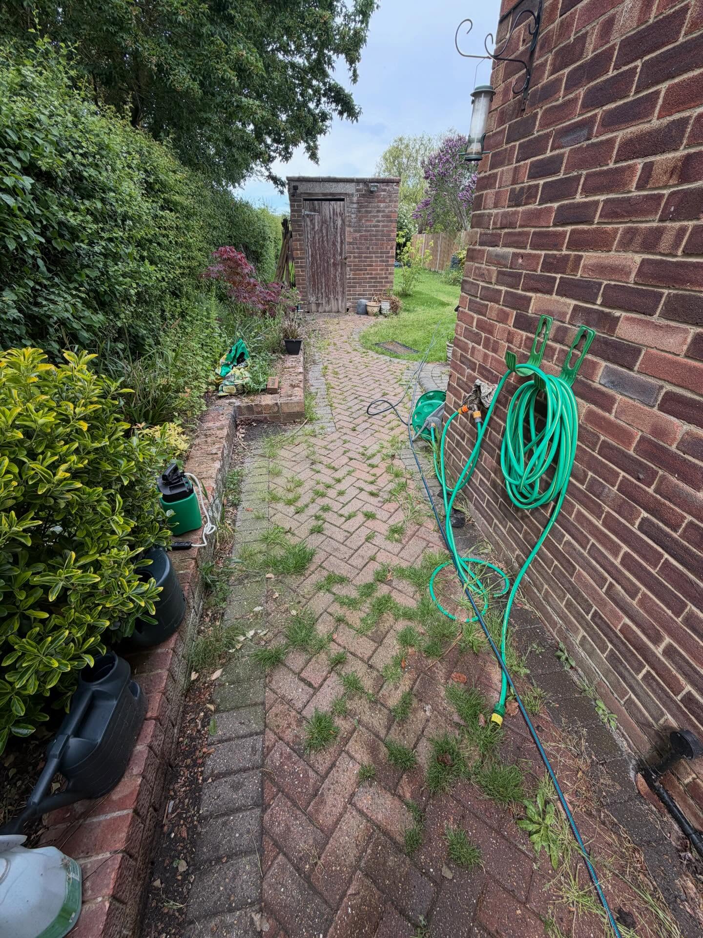 Patio before pressure washing in Hastings by Weeks Exterior Cleaning