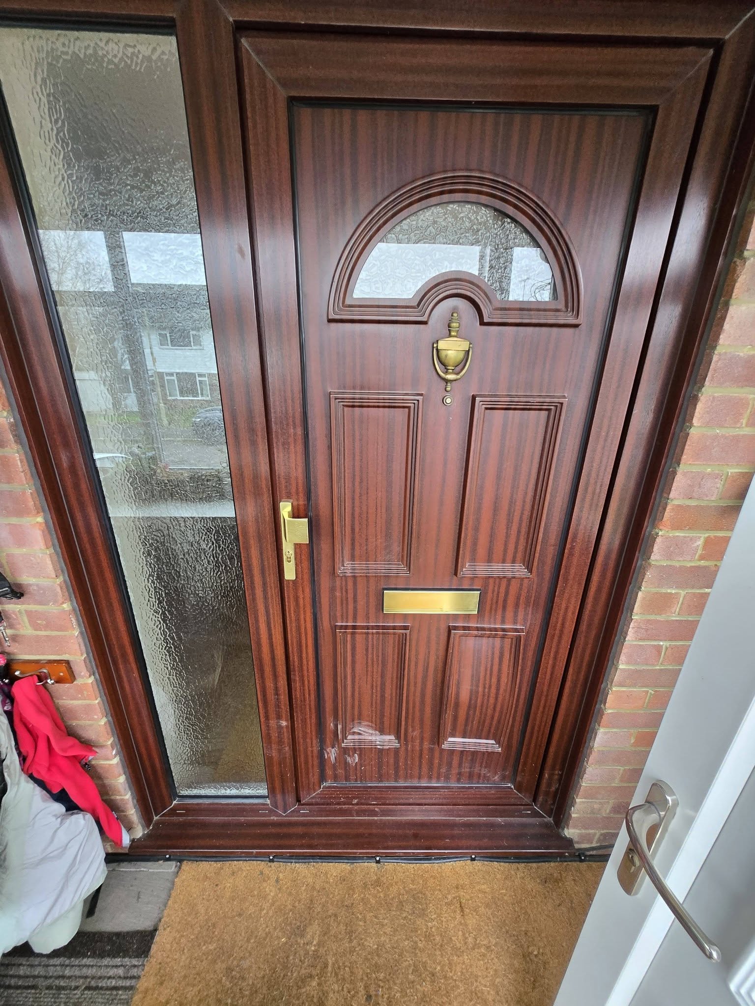 Old exterior door before professional door replacement in Winchester, Hampshire