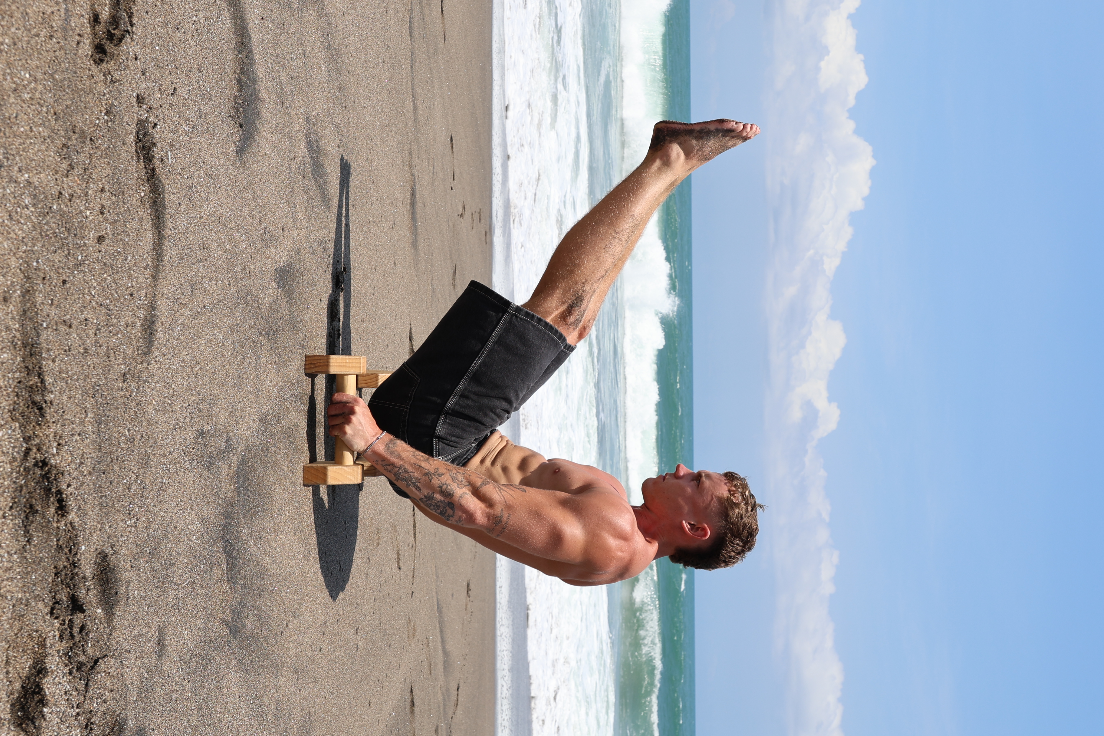 Matt doing a V-sit on the beach