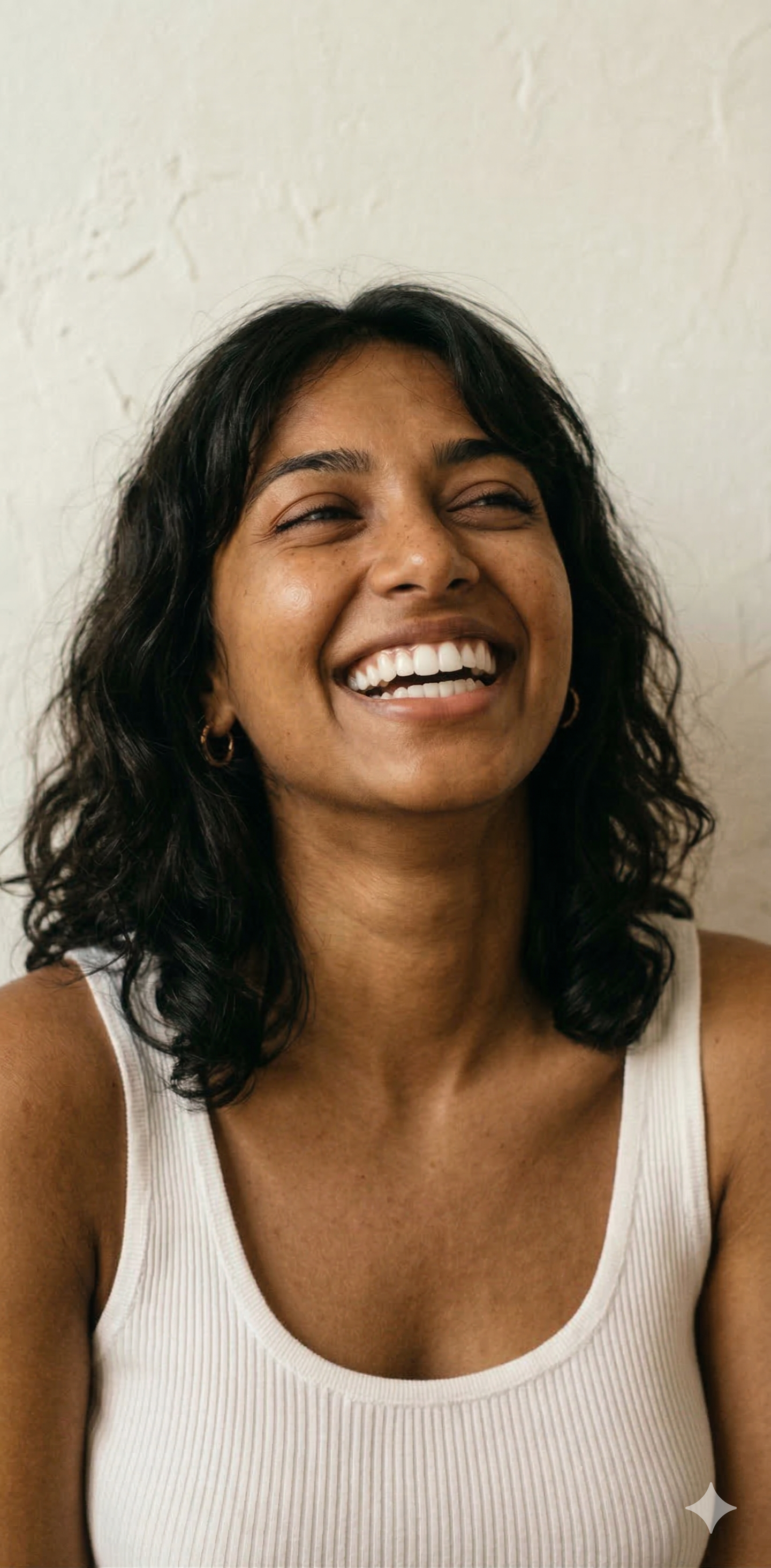 Patient smiling after clear aligner treatment