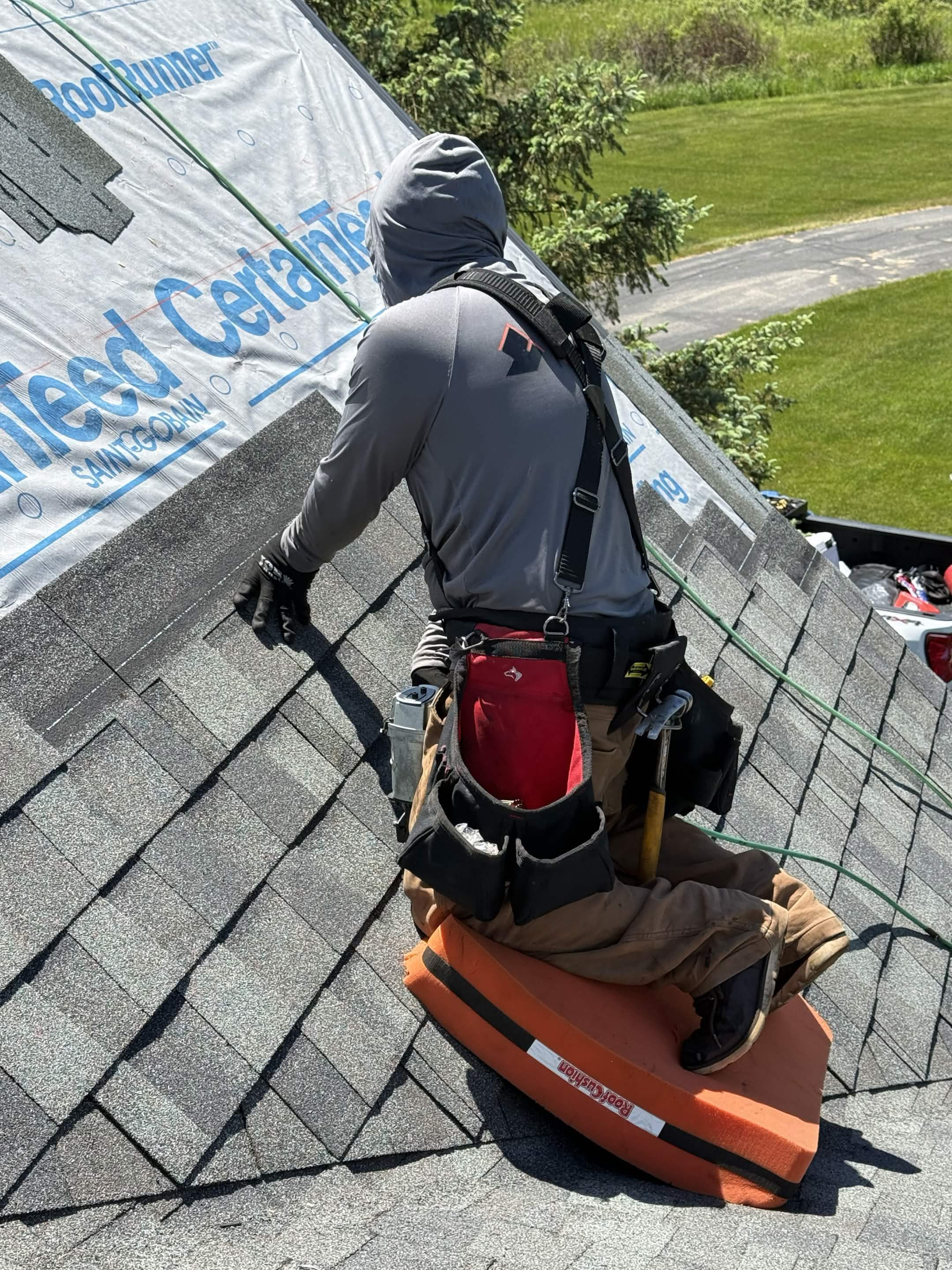 Roofer on Roofing Pad Roof Cushion