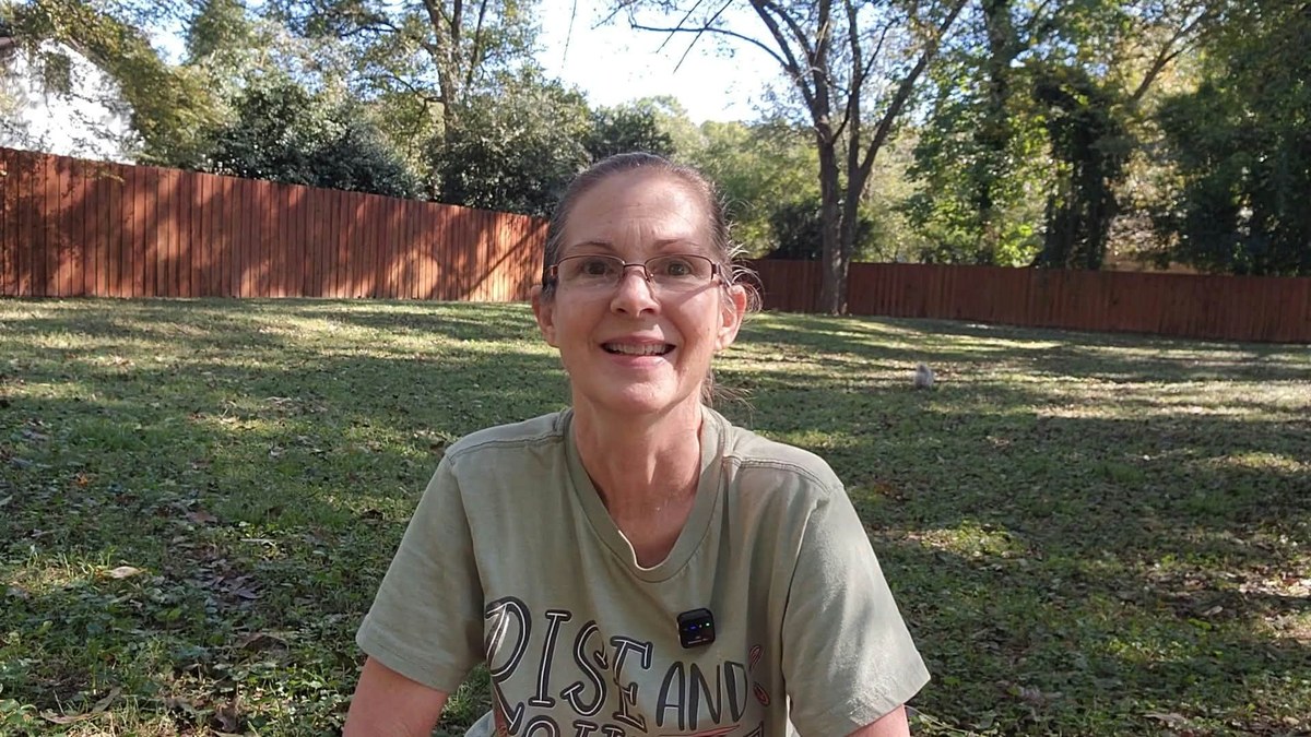 Donna Little of The Coop Scoop smiling in her backyard while talking about fall egg laying Donna Little of The Coop Scoop smiling in her backyard while talking about fall egg laying
