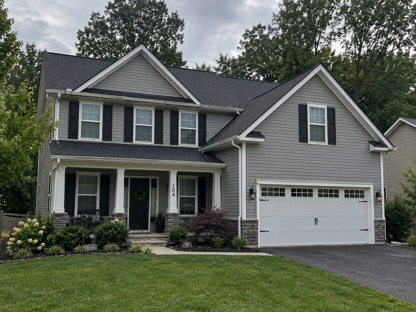 Gutters and downspouts on a residential home exterior