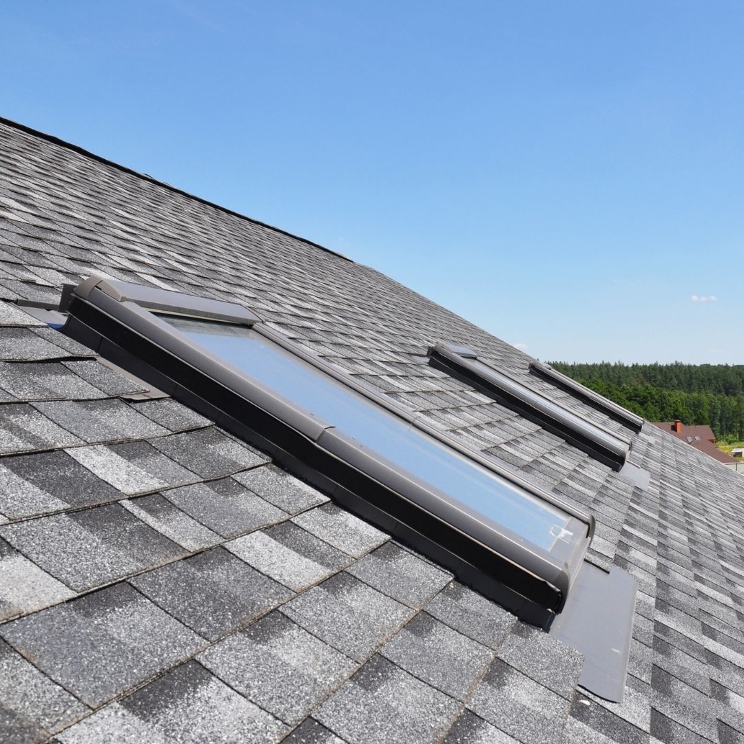 Skylight installed on a residential shingle roof