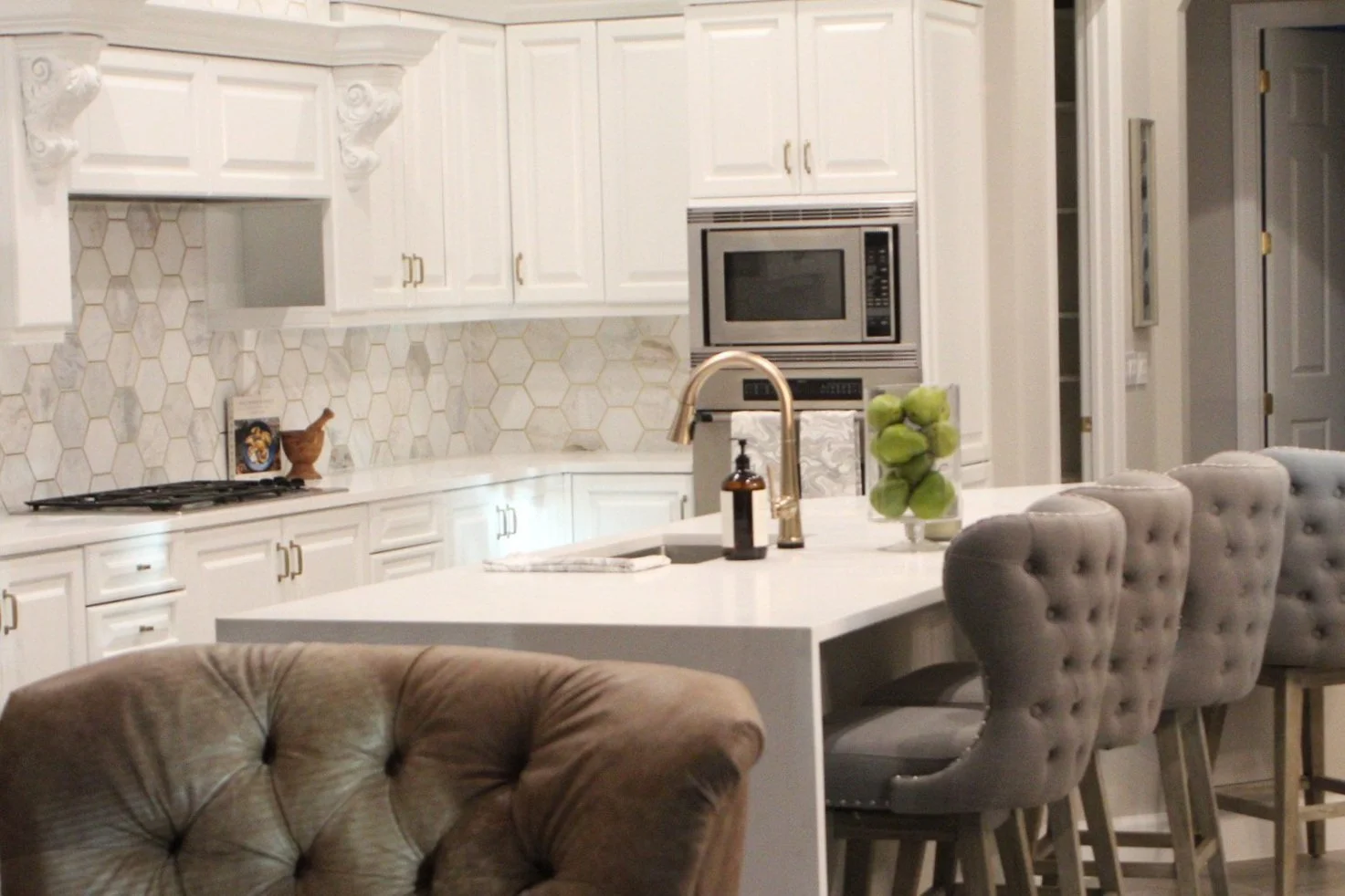 White kitchen with hexagon tile backsplash