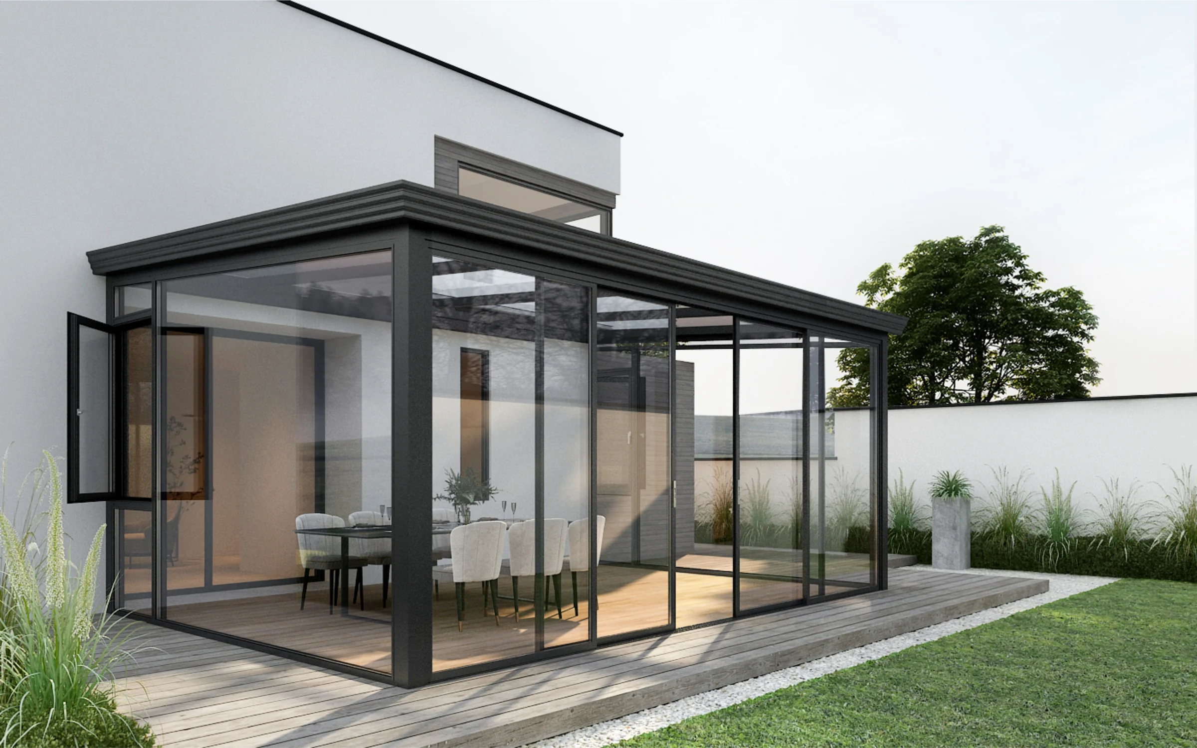 Glass-enclosed sunroom with dark aluminum framing beside a modern home.
