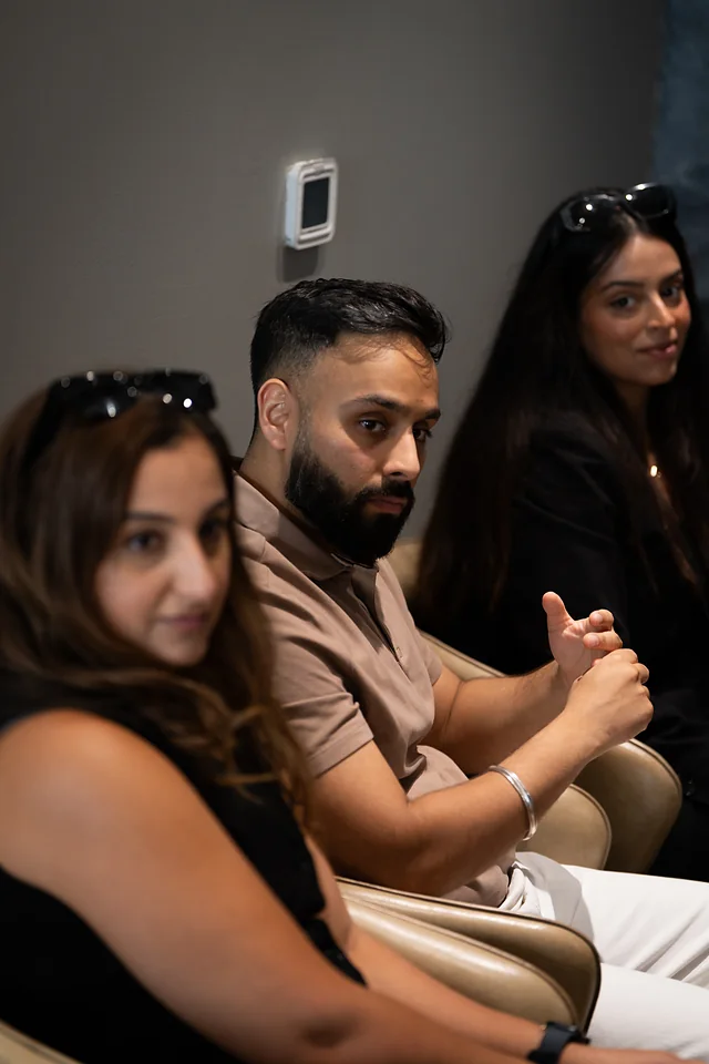 Guests listening during a discussion